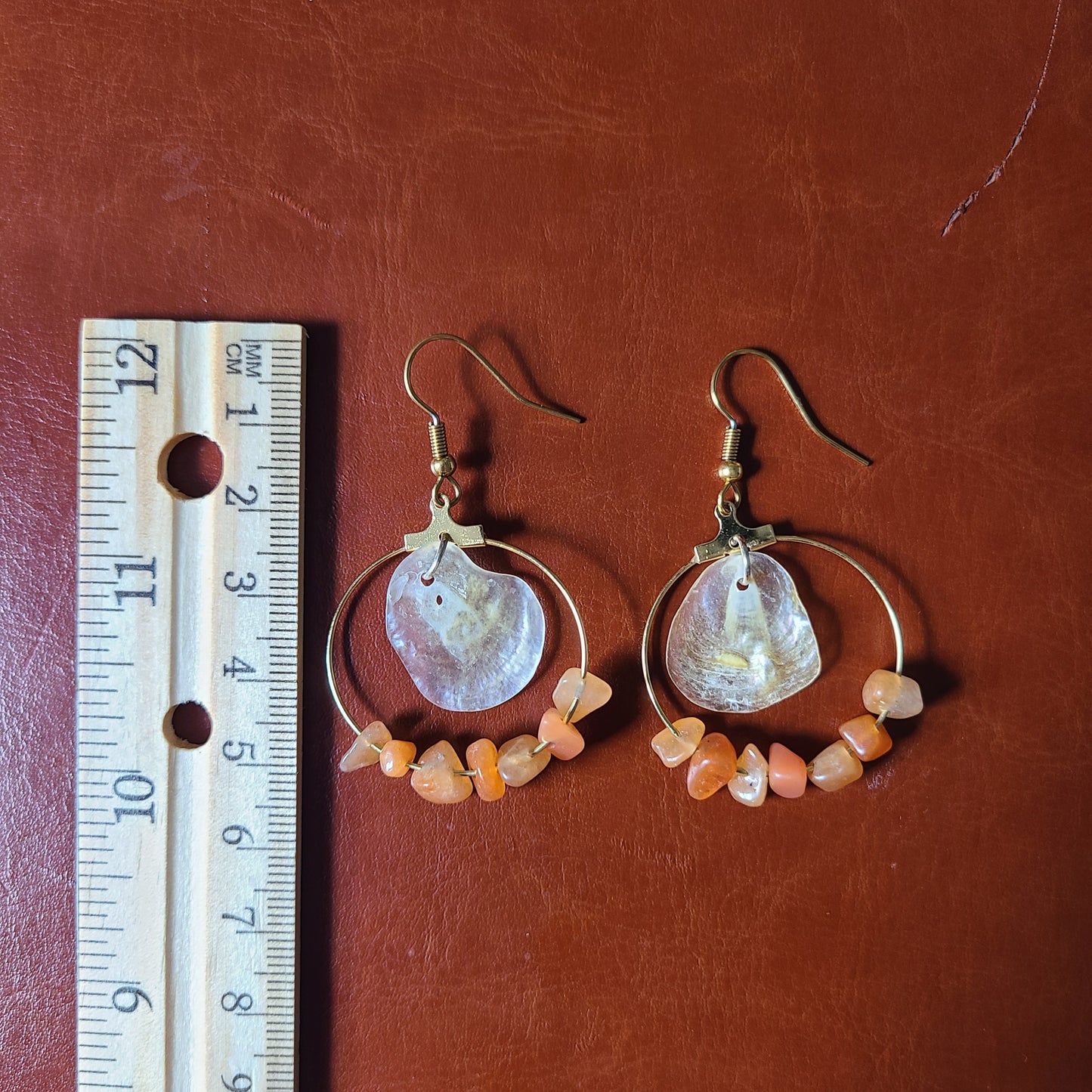 Elegant Cream Jingle Shell and Amber Colored Stone Hoop Earrings