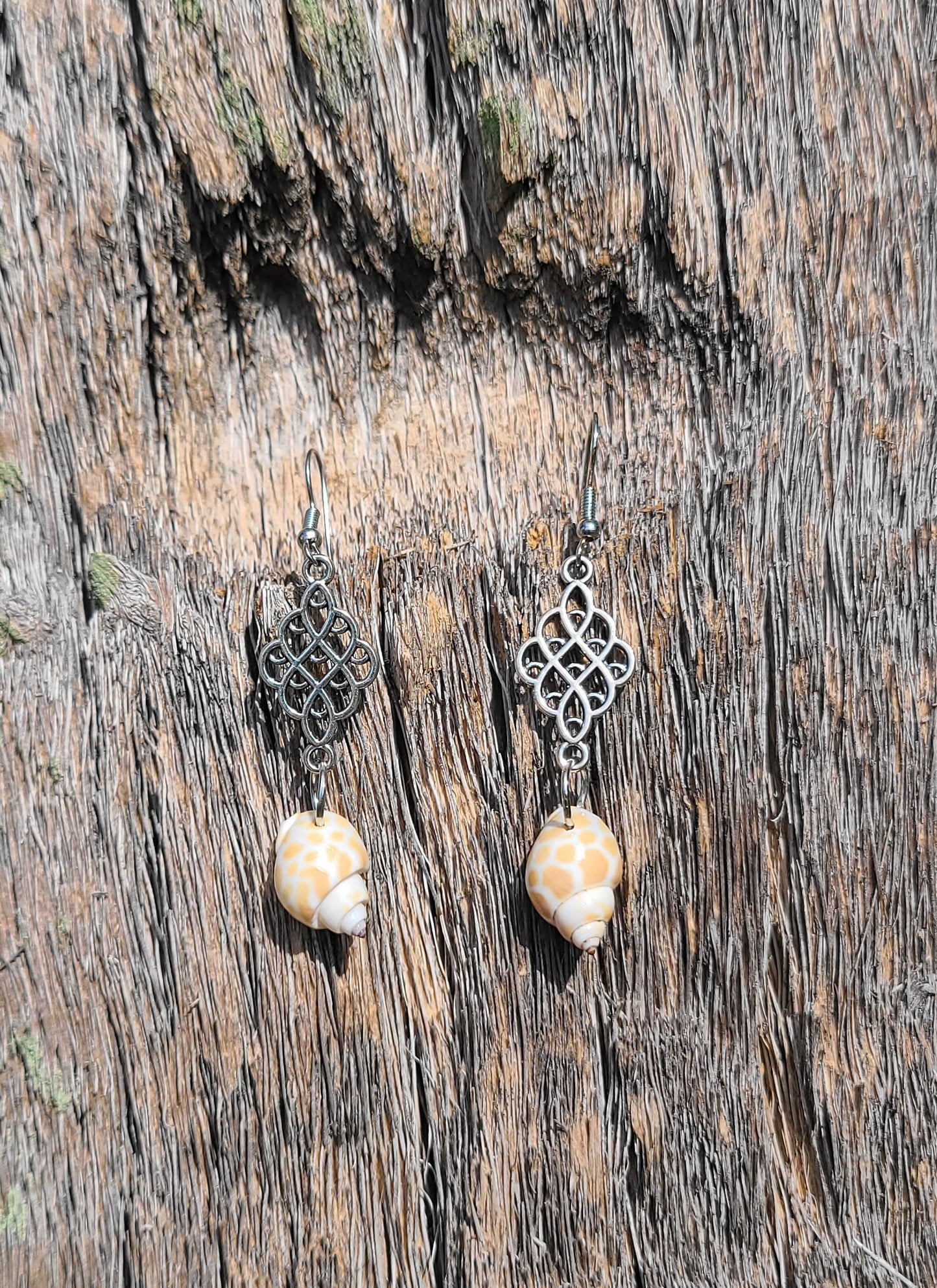 Beautiful Dainty Giraffe Print Babylonia Dangle Shell Earrings.