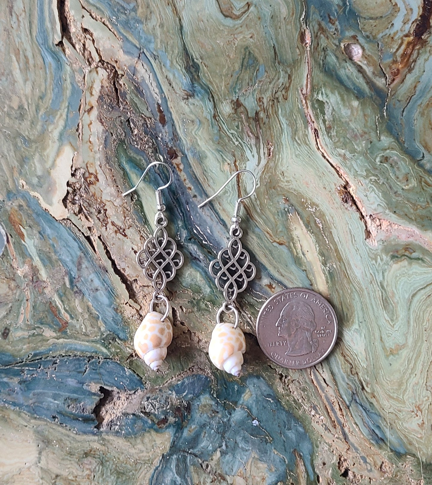 Beautiful Dainty Giraffe Print Babylonia Dangle Shell Earrings.