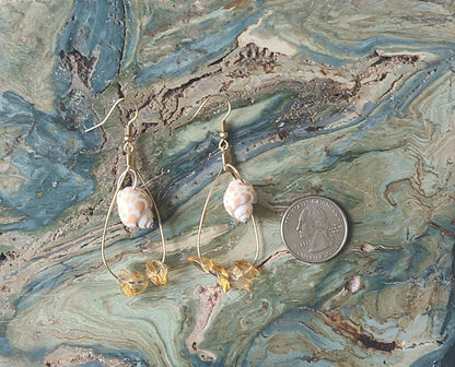 Beautiful Dangle Earrings with Giraffe Print Babylonia Shells and Yellow Amber Colored Stones.