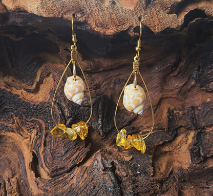 Beautiful Dangle Earrings with Giraffe Print Babylonia Shells and Yellow Amber Colored Stones.